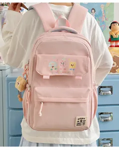 Pink cute canvas school backpack, large capacity, multi pockets, cute cookie print for daily use.