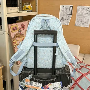 Lightweight blue student backpack with stylish star pattern for casual daily commute school.