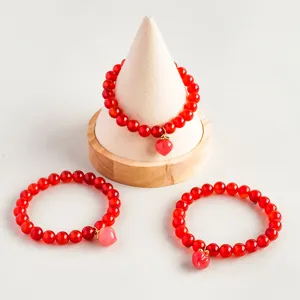 Natural red agate beaded single-circle bracelet with cute peach pendant jewelry main view.