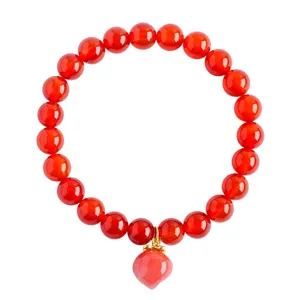Natural red agate round bead bracelet with lovely peach pendant, elegant jewelry for women.