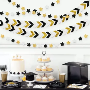 Graduation party decoration set with black white gold garlands plates and cupcakes display.