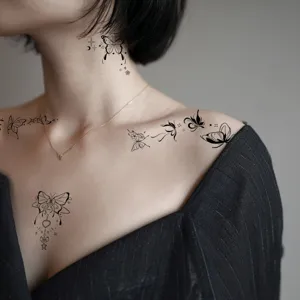 Minimalist black butterfly temporary tattoo sticker detail, elegant line art design for chic style.