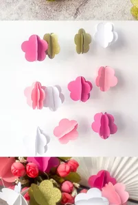 Detail view of 3D paper flower garland hanging decoration for party layout and kids room.