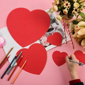 Valentine heart paper cutouts red pink heart cards for wedding party decoration details.
