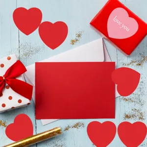 Valentine's Day heart paper cutouts red pink cards wedding party decoration details view.