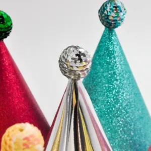 Glitter sequin party hat detail shot, cone hat with top ball for celebration events