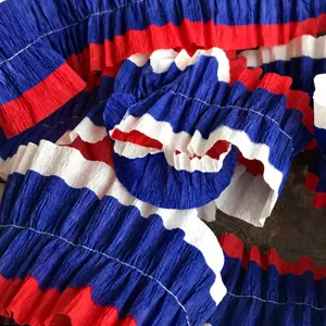 Red white blue sewn crepe paper roll for US Independence Day party hanging decoration detail