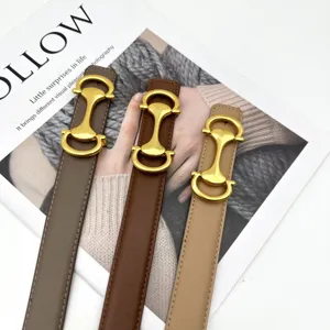 Women's genuine leather belt with elegant gold buckle, versatile fashion accessory for jeans.
