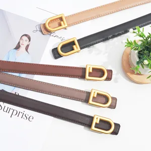 Women thin leather belt set with gold metal buckle, stylish accessory for jeans and dresses.