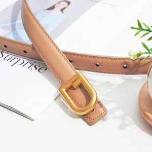 Elegant light brown leather belt with stylish gold buckle, minimalist design for women.