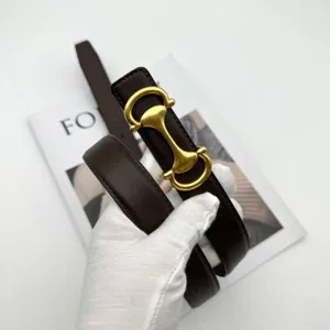 Classic dark brown leather belt for women with gold buckle, versatile for jeans and suits.