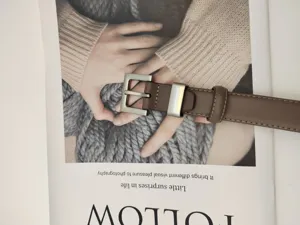 Classic brown genuine leather belt for women featuring sleek silver metal buckle daily wear
