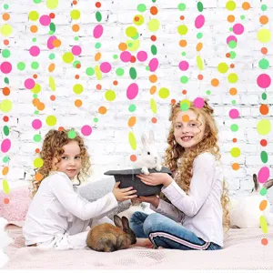 Neon paper circle garland decorations for glowing night parties, colorful hanging dots dots.