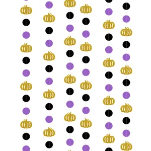 Detailed view of Halloween paper garland featuring gold glitter pumpkins and dots for party decor.