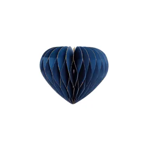 Décoration de cœur en papier alvéolé bleu foncé avec bordure pailletée dorée pour Noël.