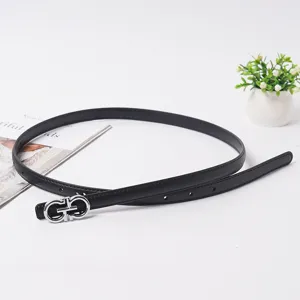 Elegant women black thin leather belt with stylish silver buckle for jeans dress suitor.
