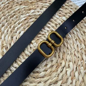 Classic women's black leather belt with elegant gold-tone metal buckle for daily wear.