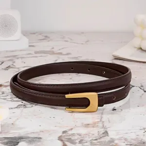 Stylish brown leather belt for women with elegant gold U-buckle, perfect for dresses.
