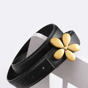 Women genuine leather belt with stylish gold flower buckle for casual jeans and suits.
