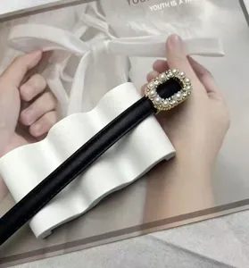 Women's skinny black leather belt with elegant pearl rhinestone buckle for dresses pants stylish.
