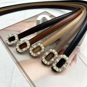 Women's thin leather belt with elegant pearl rhinestone rectangular buckle, multi-color accessory.