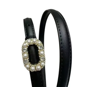 Black leather skinny belt with elegant pearl and rhinestone oval buckle for women dresses.