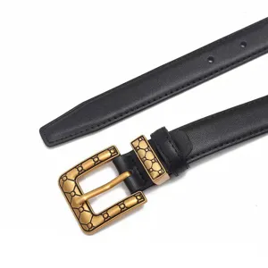 Women's black genuine leather belt with vintage gold buckle, versatile stylish waist accessory.