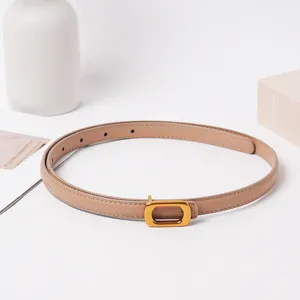Ceinture élégante minimaliste en cuir véritable pour femme avec boucle dorée chic.
