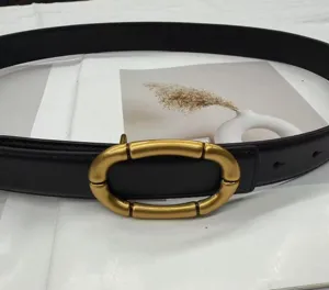 Women's black genuine leather belt with stylish gold segmented oval buckle for jeans