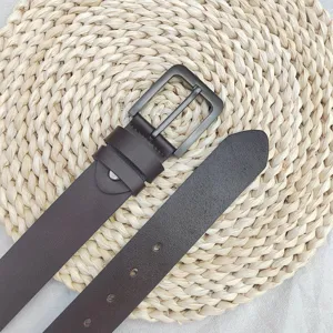 Men's casual brown genuine leather belt with matte metal pin buckle, detailed close-up shot.