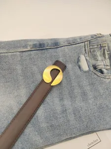 Women genuine leather belt with stylish gold geometric buckle versatile jeans accessory.