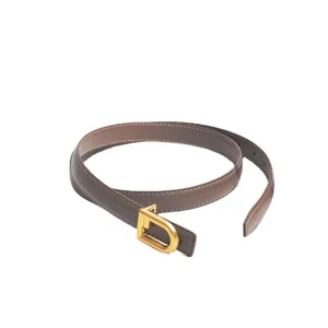 Women brown leather thin belt with gold D buckle versatile stylish accessory for jeans skirt.