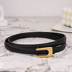 Minimalist black leather belt for women, elegant gold U-shaped buckle waist strap for dresses and jeans.