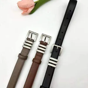 Slim leather belt detail with metal buckle and multi-ring decoration for women stylish look