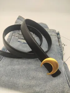 Stylish women leather belt with gold crescent moon buckle, chic waist accessory for jeans.