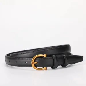Detailed view of women's black genuine leather thin belt with gold pin buckle for daily wear.
