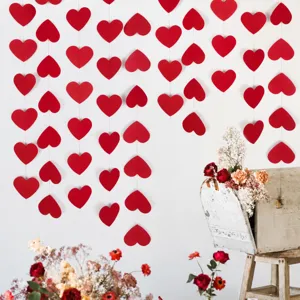 Valentine day red paper heart string garland details, perfect for party and wedding decor.