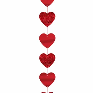 Red heart hanging garland for Valentine's Day party and wedding room decoration detail.