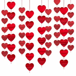 Valentine's day red heart hanging string decorations for wedding party and room setup.
