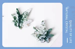 Natural crystal moss agate maple leaf carving detail showing intricate green patterns.