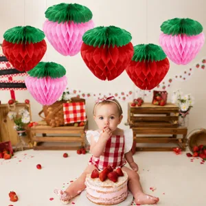 Strawberry paper honeycomb balls hanging decorations for kids birthday party and baby shower.