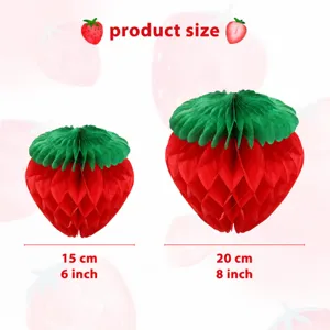 Strawberry paper honeycomb ball hanging decoration for fruit themed birthday party.