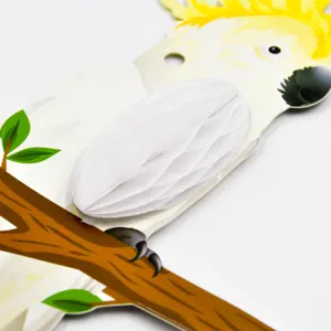 Close-up of 3D paper honeycomb parrot hanging decor for Hawaiian party and kids room.