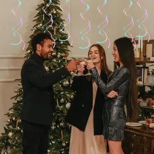 Holographic PVC swirl hanging decorations, colorful laser ceiling party decor streamers for festivals.