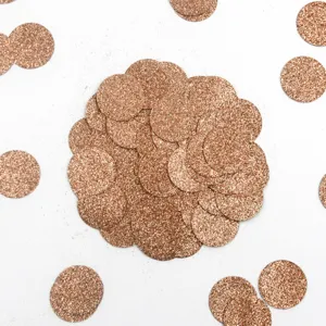 Rose gold round glitter confetti for wedding party table decoration and birthday celebrations.