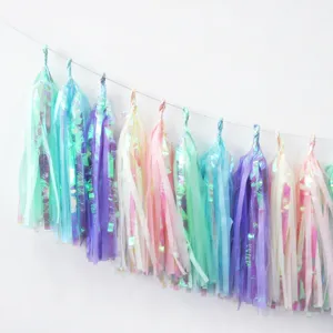 Close-up details of the iridescent paper tassel garland for party and wedding decor.
