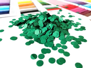 Green round paper confetti for party decorations, wedding table scatter and gift box filler.