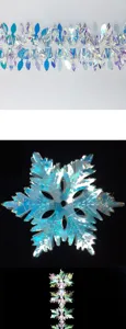 Iridescent snowflake garland hanging ornament detail, ideal for Christmas party decor.