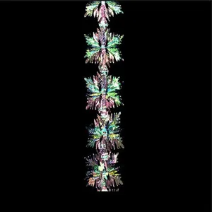 Detailed view of the iridescent holographic garland hanging decoration for party and festival.