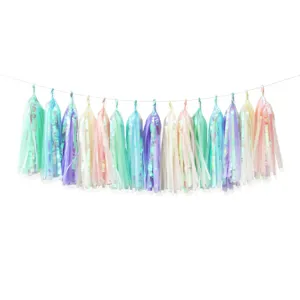 Detailed view of the colorful iridescent tassel garland showcasing shimmering rainbow film material.